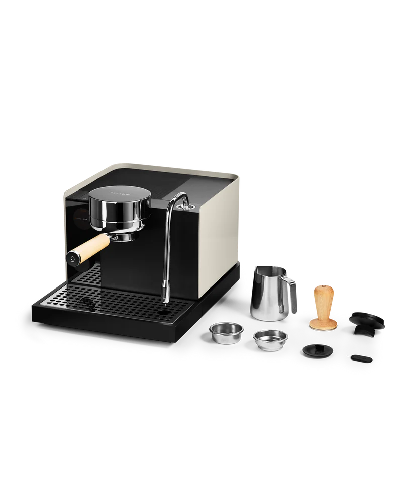 Fellow Espresso series 1 espresso machine with accessories for home baristas, designed for precision in coffee brewing.