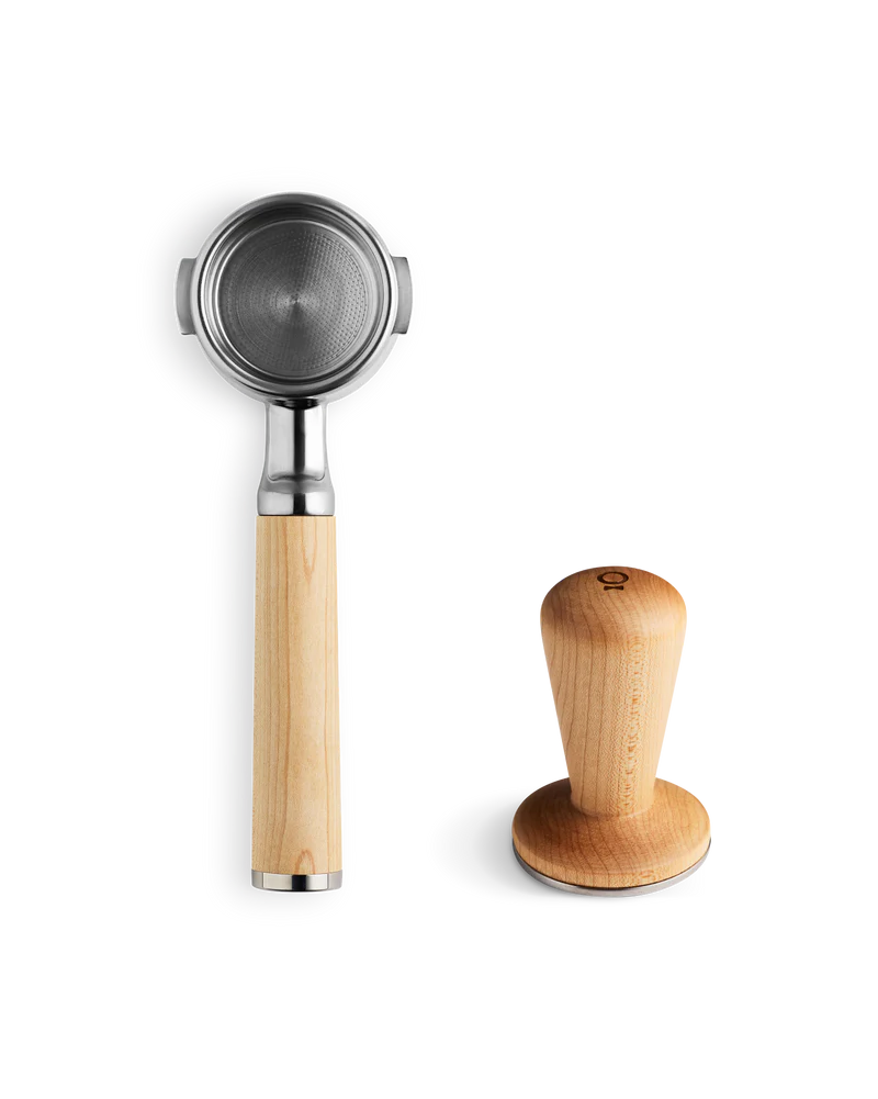 Fellow Espresso Series 1 portafilter with wooden handle and tamper on a white background.